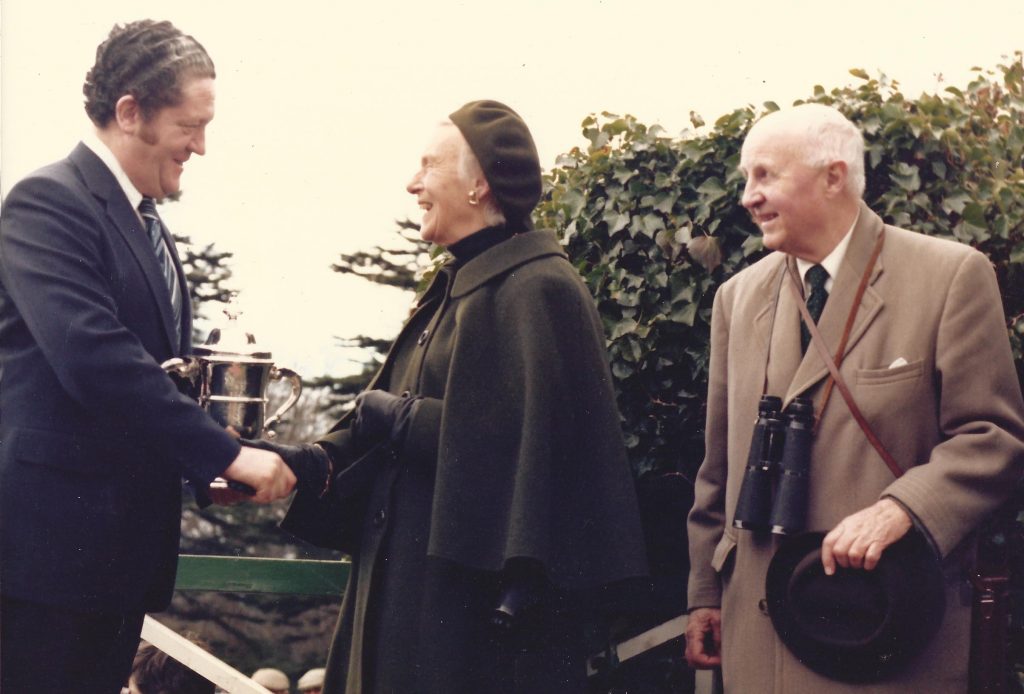 Lord and Lady Donoughmore being congratulated by Brian Lenehan, after their horse Orchestra won The Rank Cup at The Phoenix Park and became the first winner for John Oxx in 1979.